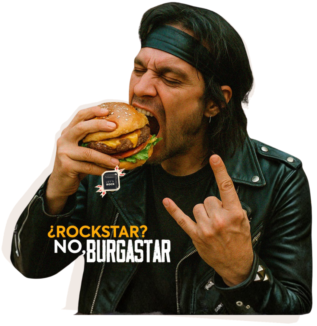 Hombre con estilo rockero mordiendo una hamburguesa junto al eslogan "¿Rockstar? No, burgastar"